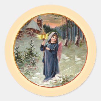 Angel With Lantern Classic Round Sticker by justcrosses at Zazzle