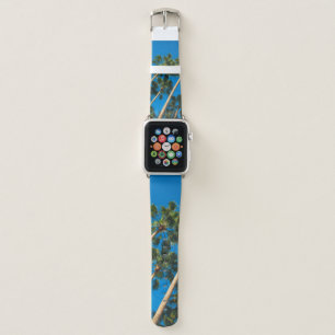 Angle perspective of group of tall thin palm trees apple watch band