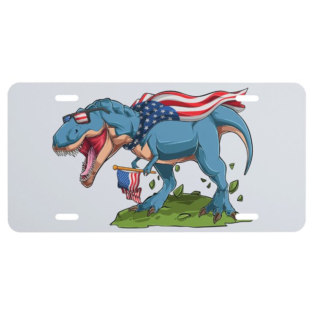 Angry Dinosaur License Plate (A cartoon illustration features a blue Tyrannosaurus Rex wearing sunglasses with an American flag.)