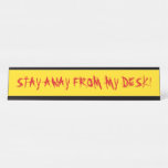[ Thumbnail: Angry, Red "Stay Away From My Desk!" On Yellow Desk Name Plate ]