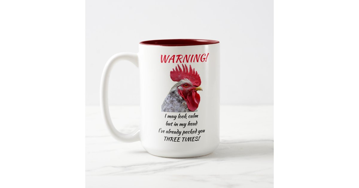 https://rlv.zcache.com/angry_rooster_two_tone_coffee_mug-raa1877576a61442294d2a67b8b3fb1c0_x7j5y_8byvr_630.jpg?view_padding=%5B285%2C0%2C285%2C0%5D