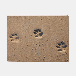 Animal paw prints in sand doormat