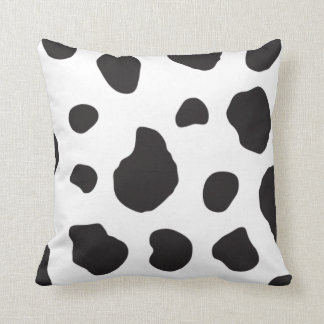 black and white cow print pillows