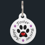 Animal Rescue Dog Tag<br><div class="desc">This dog tag features a paw print with a red heart inside. Supports animal rescue with the words adopt, foster and rescue separated with purple paw prints. Ideal for use by animal shelters, animal rescues or any animal lover! These could also be used by animal shelters as a raffle item...</div>