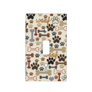 Animated dog paws and bones light switch cover