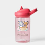 Anime Tuffy and Jerry Cheesecake Water Bottle<br><div class="desc">This charming anime graphic features Tuffy and Jerry, the classic characters from "Tom and Jerry, " enjoying a delightful treat together. Tuffy sits triumphantly atop a large slice of cheesecake, while Jerry gleefully nibbles at the cake beside him. The image is set against a simple background that highlights the joyous...</div>