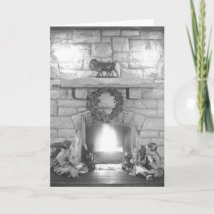 Annice and Margot Belden sitting by a fireplace at Holiday Card