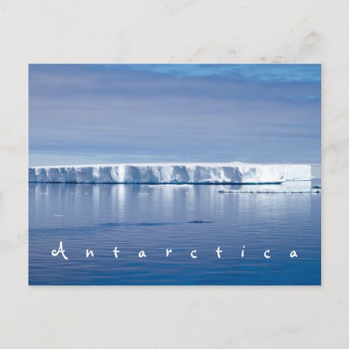 Antarctica iceberg landscape photo with white text postcard