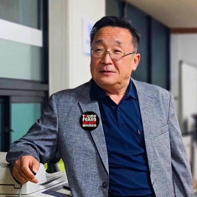 Anti trump feminist protest slogan red black button (Creator Uploaded)