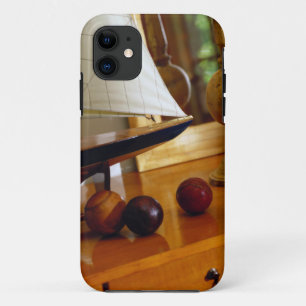 Antique Baseballs On A Table By A Model Sailboat iPhone 11 Case