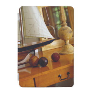 Antique Baseballs On A Table By A Model Sailboat iPad Mini Cover