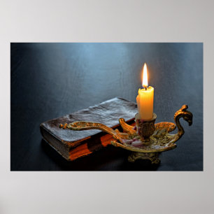 Antique book and a firing candle poster