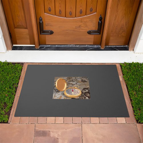 Antique Compass On A Map Doormat