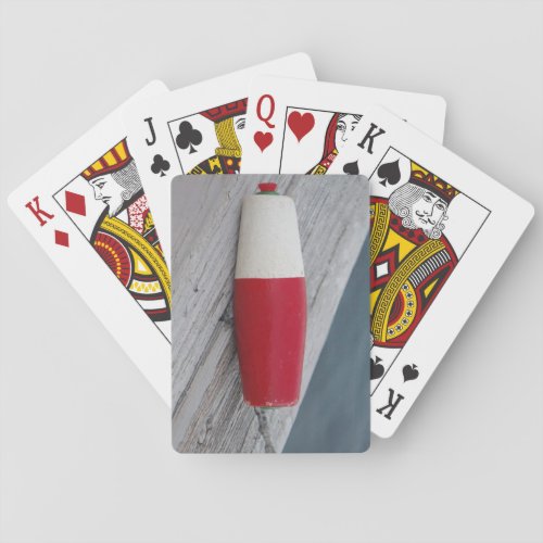 Antique fishing bobber red white and green playing cards