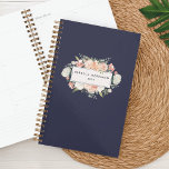 Antique Floral Personalized Planner | Midnight<br><div class="desc">Start the new year in style and keep track of your appointments and key date with our chic floral planner. Personalized design features a rich midnight blue background with your name and the year on a watercolor floral badge with clusters of blush pink, peach and cream rose and peony flowers....</div>