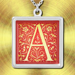 Antique ornamental monogram -  capital A Silver Plated Necklace<br><div class="desc">Antique ornamental monogram - capital A in red and cream ..Beautiful medieval initial from the 16th century .Courtesy of the Internet Archive Book Images . The original image was retouched and applied on this item by Alma Wad . This necklace is great for Arthur , Anthony , Andrew and more...</div>