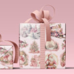 Antique Pink Victorian Christmas Wrapping Paper<br><div class="desc">This holiday gift wrapping paper features a delicate seamless pattern design of soft blush pink, ivory, cream, rose and white fussy antique Victorian Era ephemera Christmas themed illustrations from yesteryear, on a faint powder pink background. Graphic depictions include Santa Claus, winter snowscapes, a train, a church, Christmas presents, a decorated...</div>