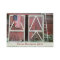 Antique Red Barn Doors With a Flag and Old Ladder
