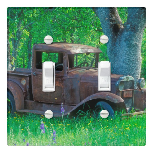 Antique rusted truck in a meadow light switch cover (In Situ)