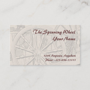 An antique spinning wheel once used to spin yarn from natural fibers such as wool. Ideal business card for someone in the arts and crafts, or the textile and clothing industry.  