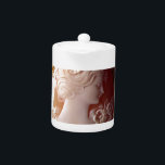 Antique victorian ivory cameo silhouette teapot<br><div class="desc">Romantic antique cameo - image of a pretty Victorian Lady - delicate filigree detail.</div>