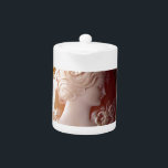 Antique victorian ivory cameo silhouette teapot<br><div class="desc">Romantic antique cameo - image of a pretty Victorian Lady - delicate filigree detail.</div>