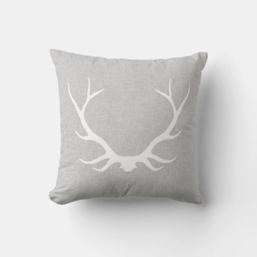 Antlers on grey linen throw pillow