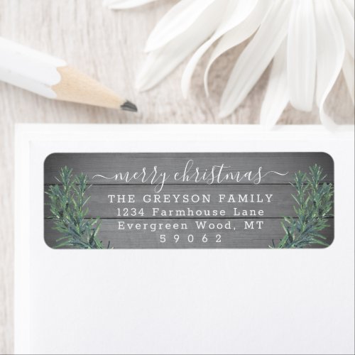 Any Text  Christmas Greenery & Wood Return Address Label - Add a stylish finishing touch to holiday card envelopes with elegant customized return address labels. All text on this template is simple to personalize to include any wording, such as Merry Christmas, Happy Holidays, Seasons Greetings, New Year Cheers etc. As an option, change script typography to family name, and use the rest for the address only. The modern farmhouse style design features a rustic gray wood background, festive watercolor pine greenery, and elegant handwritten style calligraphy. Perfect for Christmas cards and holiday party invitations.
