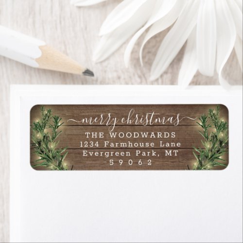 Any Text Christmas Lights & Wood Return Address Label - Add a stylish finishing touch to holiday card envelopes with elegant customized return address labels. All text on this template is simple to personalize to include any wording, such as Merry Christmas, Happy Holidays, Seasons Greetings, New Year Cheers etc. As an option, change script typography to family name, and use the rest for the address only. The modern farmhouse style design features a rustic brown wood background, festive watercolor pine greenery with string lights, and elegant handwritten style calligraphy. Perfect for Christmas cards and holiday party invitations.