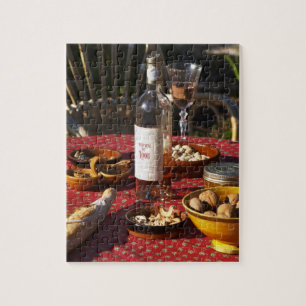 Aperitif and appetizers prepared: bread, olives, jigsaw puzzle