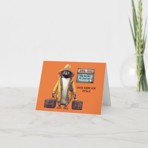 Apil fools day penguin with suitcases  holiday card