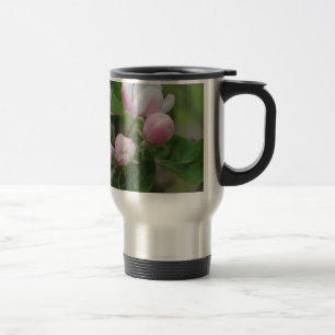 apple blossom and green leaves travel mug