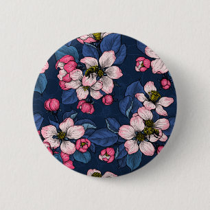 Apple blossom on a dark blue button