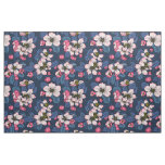 Apple blossom on a dark blue fabric