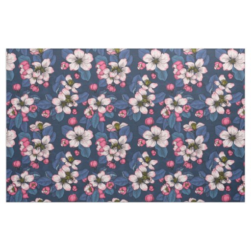 Apple blossom on a dark blue fabric