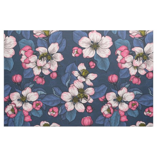 Apple blossom on a dark blue fabric