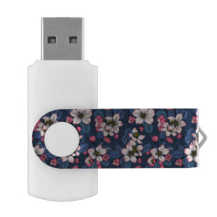 Apple blossom on a dark blue flash drive