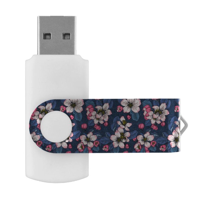 Apple blossom on a dark blue flash drive (Opened)