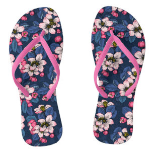 Apple blossom on a dark blue flip flops
