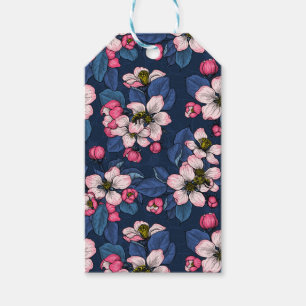Apple blossom on a dark blue gift tags