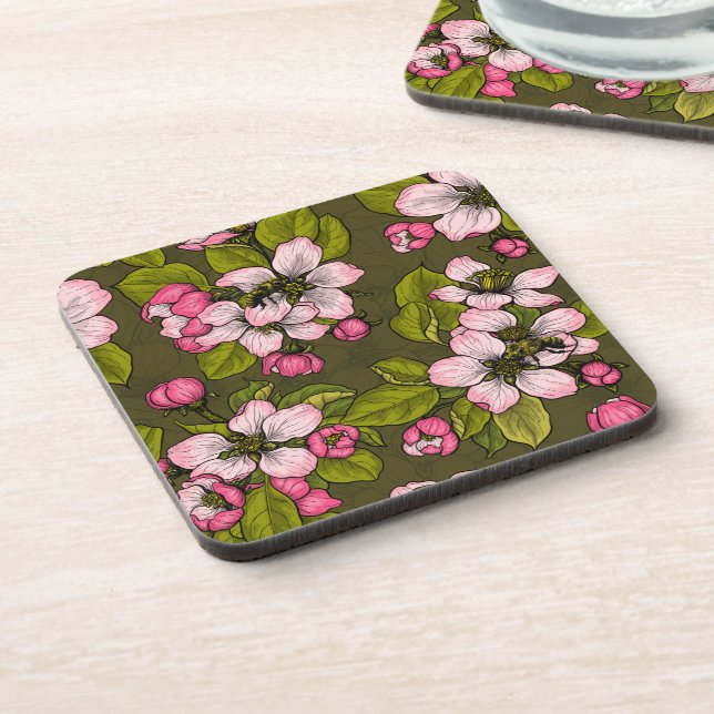 Apple blossom on dark green beverage coaster (Left Side)