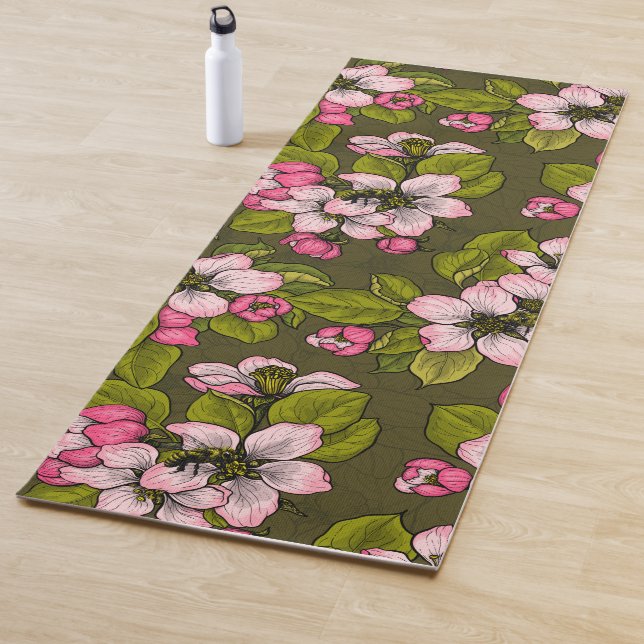 Apple blossom on dark green yoga mat (In Situ)
