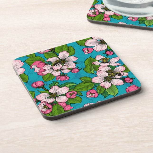 Apple blossom on turquoise beverage coaster (Left Side)