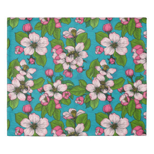 Apple blossom on turquoise duvet cover