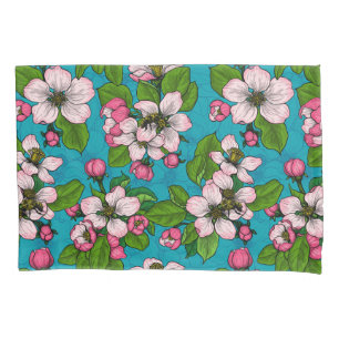 Apple blossom on turquoise pillow case