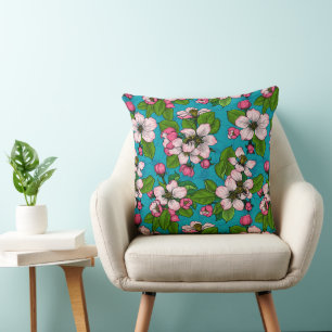 Apple blossom on turquoise throw pillow