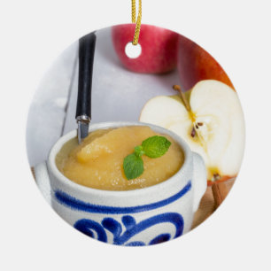 Applesauce with cinnamon in stoneware bowl ceramic ornament