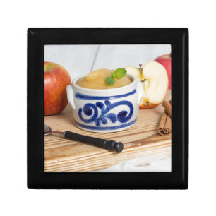 Applesauce with cinnamon in stoneware bowl jewelry box