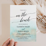 Aqua and Gold Watercolor On The Beach Wedding Invitation<br><div class="desc">This aqua and gold watercolor on the beach wedding invitation is perfect for a tropical destination wedding. The simple and modern design features stunning turquoise, teal and light blue watercolor with a soft gold sparkle reminiscent of the sand and sea. It's paired with gorgeous elegant calligraphy. Please Note: This design...</div>