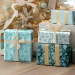 Aqua Blue Christmas Coastal Glitter Seahorses  Wrapping Paper Sheets<br><div class="desc">This ocean inspired coastal Christmas wrapping paper set features aqua blue glitter seahorses,  seashells,  and holly sprigs,  on aqua blue,  dark teal,  and white backgrounds. If you would like this design on more products or other colorways,  or for other design-related inquiries,  please contact me through Zazzle Chat.</div>